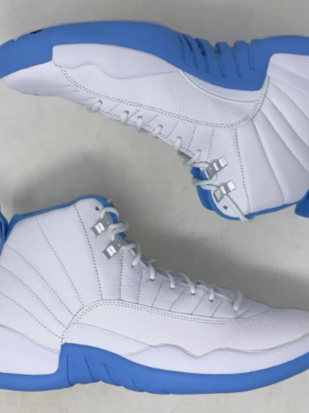 Air Jordan 12 'Melo UNC University Blue' White Sneakers